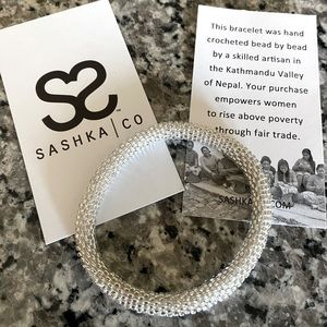 SASHKA CO silver glass beaded bracelet. Rolls over your hand on to your wrist.